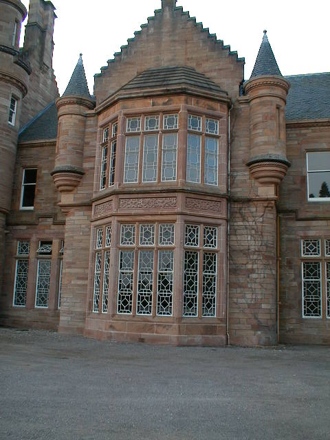 An ornate window at the front of the castle.
