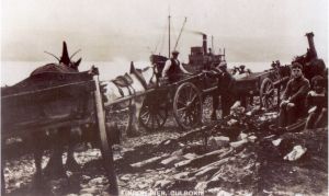 A photograph shows the unloading of coal at Findon pier.