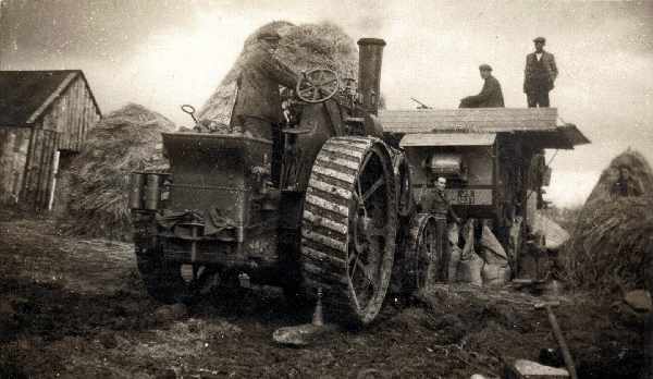 Harvesting in the 20th Century with traction engine JS1237 and threshing machine.