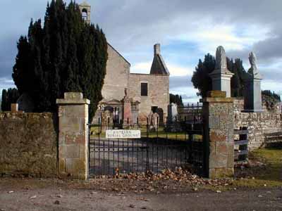The entrance gate with Kiltearn Old Church in the background.