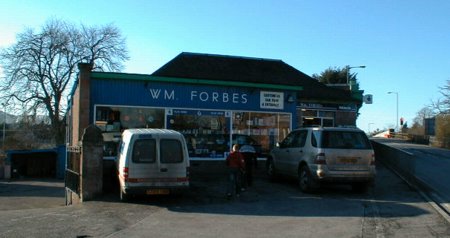 Zoom in William Forbes, the very popular grocer and baker's shop