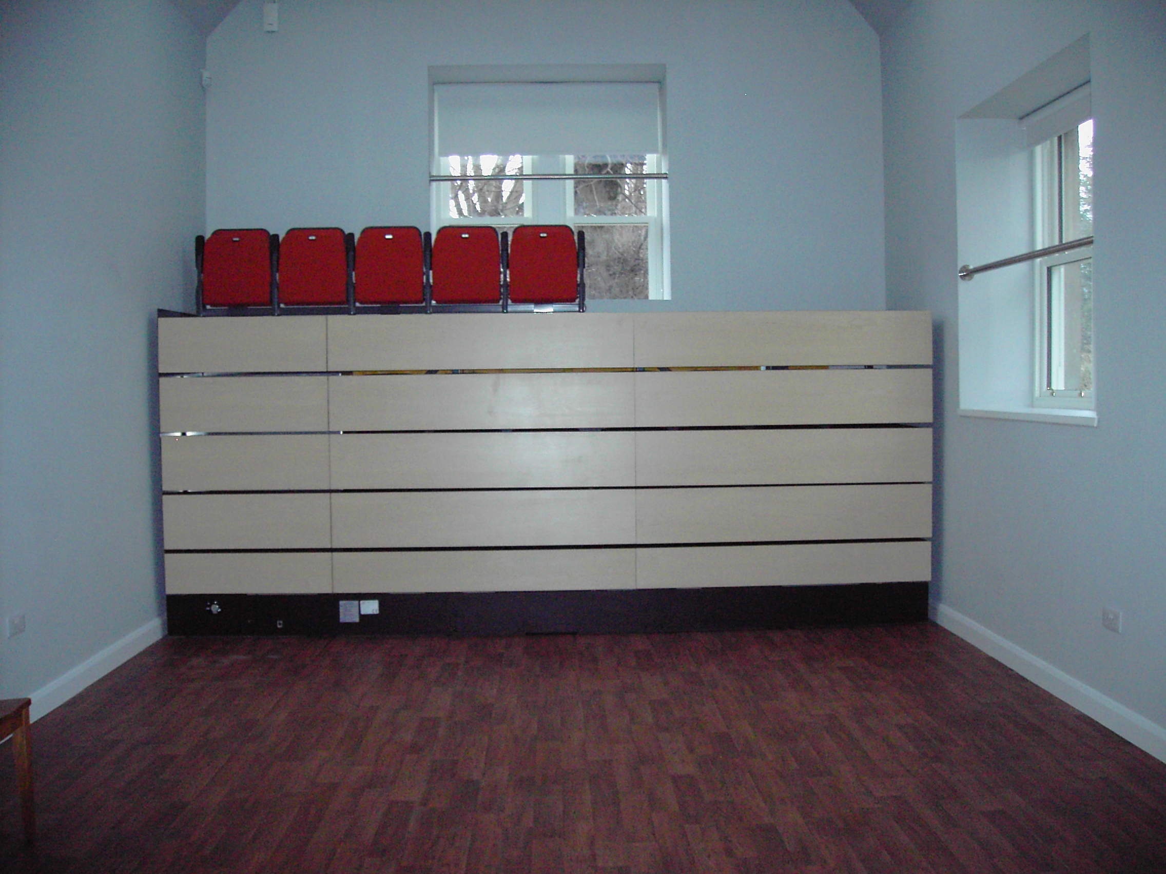 Zoom in 03 Retracted seating (44) in the Old School Hall.