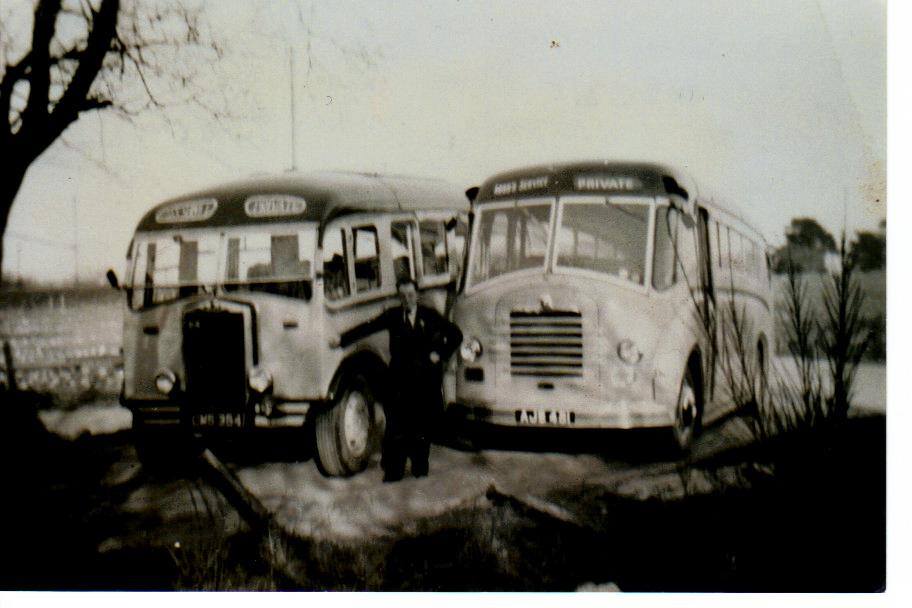John Ross is seen standing between two of his vehicles John Ross is seen standing between two of his vehicles