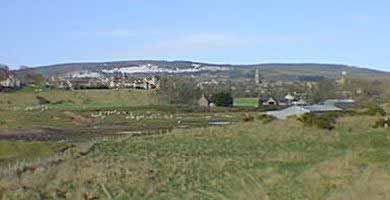 Site of Tain on the raised beach and at the foot of Tain Hill
