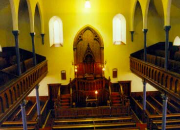 This picture shows the interior of the church, the woodwork being fine North American pine