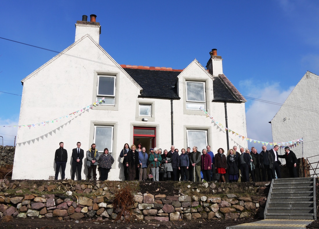 Zoom in The people of Achiltibuie at the newly-renovated schoolhouse (March 2017).