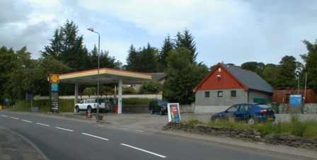Zoom in Contin garage and petrol station