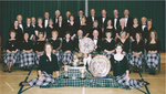 Dingwall Gaelic Choir with a selection of trophies