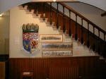 The Burgh's coat of arms and, alongside, old school photos