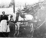 Cadger and wife return with firewood from the country.
