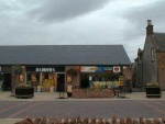 The Post Office and Haddows, High Street, Invergordon.