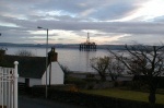 A view over Saltburn Road to the rigs in the Cromarty Firth.