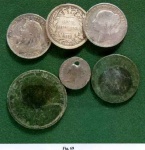 Fig 69 - halfpennies, pennies and a three-pence piece, a pierced four-penny coin, sixpence and three shillings