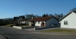 The Meadows housing estate, leading off the A862 road at the north end of the village.