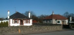Attractive bungalows on the A832 road to Marybank at the west end of the village.