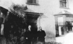 Peter D Robertson (in kilt) with friend, Castlecraig House, c.1913.