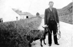 John Ross with Jenny the pet goat on lead, Nigg Road at Lower Bayfield, c.1935.