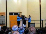 School pupils entertain - On violins