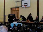 Councillor Val MacIver being presented with a bouquet